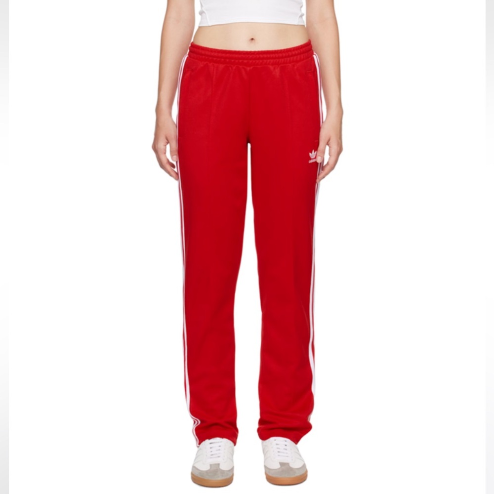 Adidas track pants.